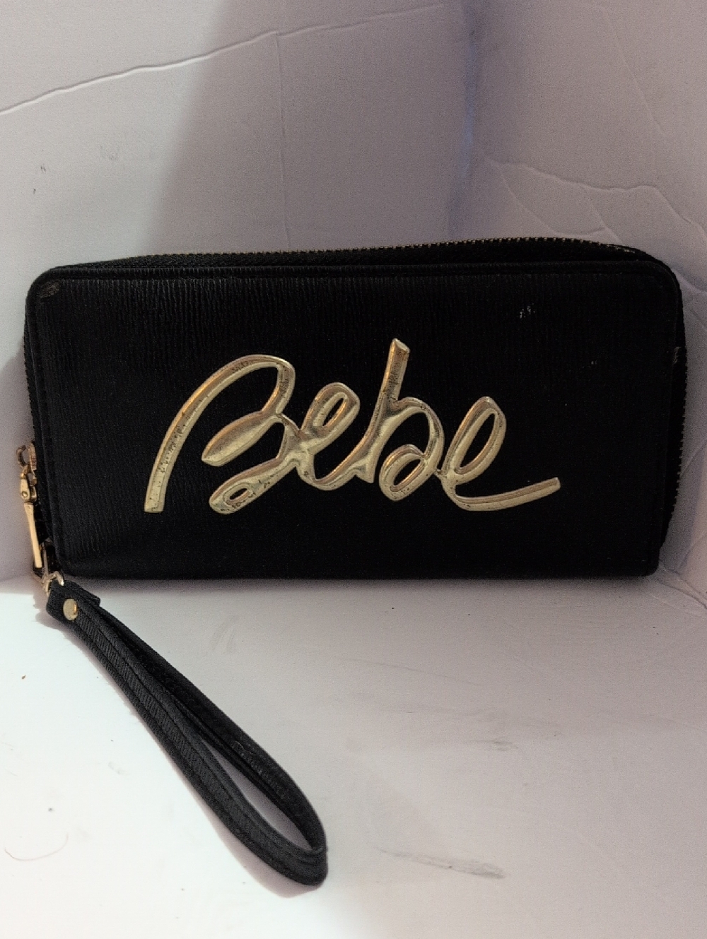 bebe Black Wristlet with Gold Logo Script